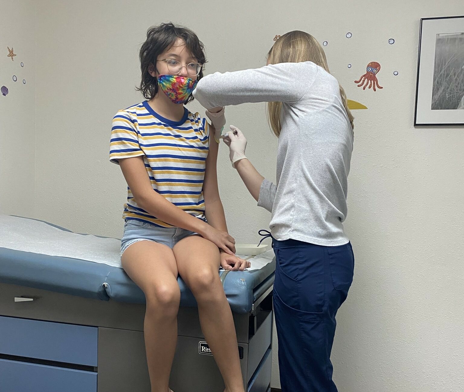 Bridget getting her Gardasil 9 HPV vaccine.